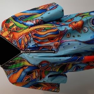 Nira Cora colorful blouse.